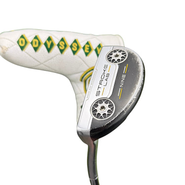 Mega Golf Odyssey Stroke Lab Nine putter, 34 inch, left hand. White headcover with green and yellow Odyssey logo.