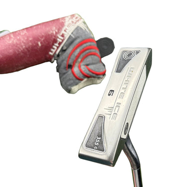 Mega Golf Odyssey White Ice #6 34" right-handed steel shaft golf putter with black grip accents.