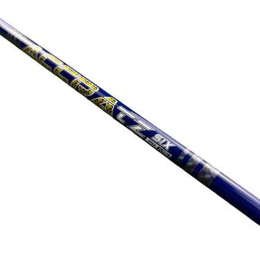Mega Golf Accra TZ Six 70 M5 X-Stiff graphite driver shaft with blue and yellow graphics.