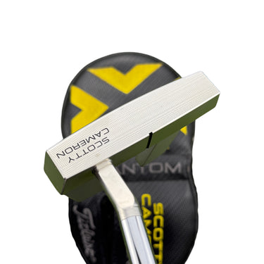 Mega Golf Scotty Cameron Phantom X 5.5 2022 putter, 33 inch, right-handed, with steel shaft and Superstroke Pistol 2.0 grip. Includes headcover.