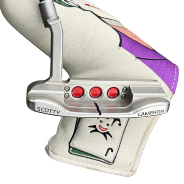 Mega Golf Scotty Cameron Select Newport 2016 right-handed steel putter with red weights and a Joker headcover.