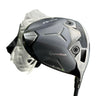 Mega Golf Taylormade Qi35 LS driver with 10.5° loft, graphite shaft, and carbon fiber face. Includes headcover.