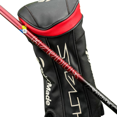 Mega Golf Taylormade Stealth Plus driver with Hzrdus Red Rdx Smoke 60G regular flex graphite shaft and headcover.